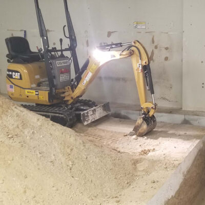 interior trenching for drainage systems - waterproofing applications in basements - concrete slab construction Rhode Island MA